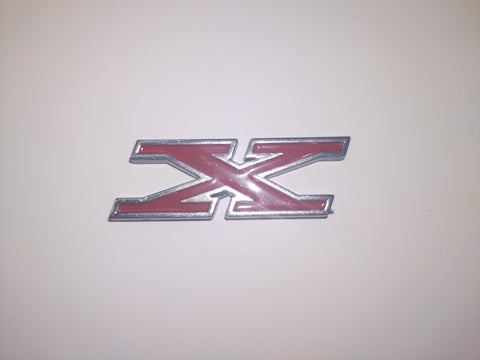 Fender, Hood Emblem, Deck Emblem "X", 2"x1.75", 1971-78 Gremlin X, 1972-76 Hornet X, 1974-75 Matador X, 1975-77 Pacer X